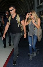 LEANN RIMES and Eddie Cibrian Arrives at Los Angeles Inernational Airport