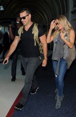LEANN RIMES and Eddie Cibrian Arrives at Los Angeles Inernational Airport