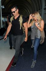 LEANN RIMES and Eddie Cibrian Arrives at Los Angeles Inernational Airport