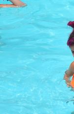 LILY ALLEN in Bikini at a Hotel Pool in New York