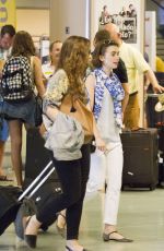 LILY COLLINS at Airport in Ibiza