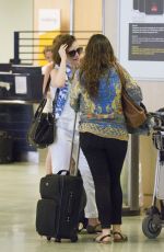 LILY COLLINS at Airport in Ibiza
