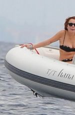LINDSAY LOHAN in Bikini in a Boat at Ischia