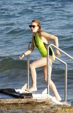 LINDSAY LOHAN in Swimsuit at a Beach in Ibiza