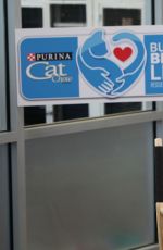 MANDY MOORE at Purina Cat Chow Building Better Lives Program in Denver