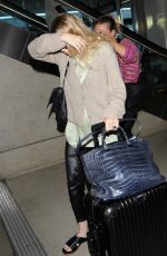 MARY KATE and ASHLEY OLSEN at LAX Airport in Los Angeles