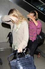 MARY KATE and ASHLEY OLSEN at LAX Airport in Los Angeles