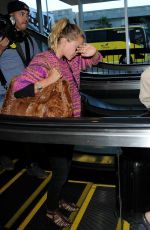 MARY KATE and ASHLEY OLSEN at LAX Airport in Los Angeles