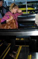 MARY KATE and ASHLEY OLSEN at LAX Airport in Los Angeles