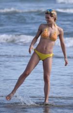 MICHELLE HUNZIKER in Bikini at a Beach in Forte Dei Marmi