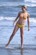 MICHELLE HUNZIKER in Bikini at a Beach in Forte Dei Marmi