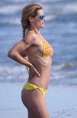 MICHELLE HUNZIKER in Bikini at a Beach in Forte Dei Marmi