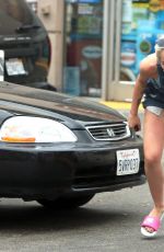 MILEY CYRUS at a Gas Station in West Hollywood