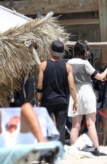 NICOLA PELTZ on the Set of Teen Vogue Magazine Photoshoot in Malibu