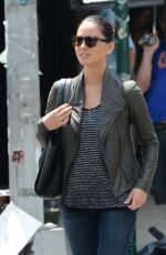OLIVIA MUNN at The Newsroom Set in New York