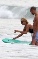 PARIS HILTON in Swimsuit and Her New Boyfriend at a Beach in Malibu