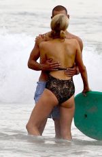 PARIS HILTON in Swimsuit and Her New Boyfriend at a Beach in Malibu