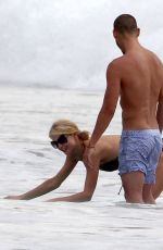 PARIS HILTON in Swimsuit and Her New Boyfriend at a Beach in Malibu