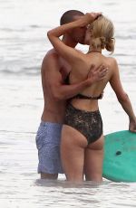 PARIS HILTON in Swimsuit and Her New Boyfriend at a Beach in Malibu