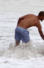 PARIS HILTON in Swimsuit and Her New Boyfriend at a Beach in Malibu