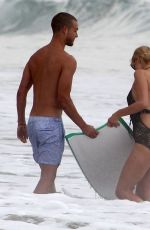 PARIS HILTON in Swimsuit and Her New Boyfriend at a Beach in Malibu
