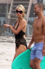 PARIS HILTON in Swimsuit and Her New Boyfriend at a Beach in Malibu
