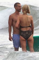 PARIS HILTON in Swimsuit and Her New Boyfriend at a Beach in Malibu