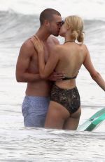 PARIS HILTON in Swimsuit and Her New Boyfriend at a Beach in Malibu