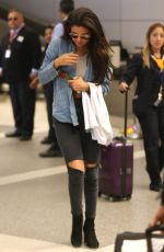 SELENA GOMEZ and CARA DELEVINGNE Arrves at LAX Airport