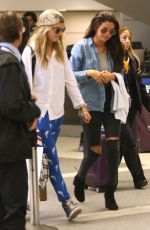 SELENA GOMEZ and CARA DELEVINGNE Arrves at LAX Airport