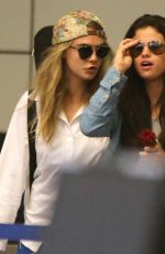 SELENA GOMEZ and CARA DELEVINGNE Arrves at LAX Airport