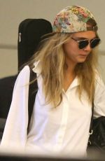 SELENA GOMEZ and CARA DELEVINGNE Arrves at LAX Airport