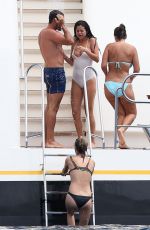 SELENA GOMEZ and CARA DELEVINGNE at a Yacht in St. Tropez