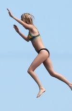 SELENA GOMEZ and CARA DELEVINGNE at a Yacht in St. Tropez