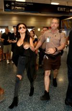 SELENA GOMEZ Arrives at Miami International Airport