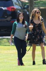ARIEL WINTER and SARAH HYLAND on the Set of Modern Family in Pasadena