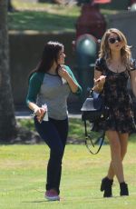 ARIEL WINTER and SARAH HYLAND on the Set of Modern Family in Pasadena