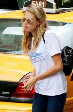 CARA DELEVINGNE Heading to a Metting in New York