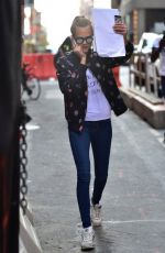 CARA DLEVINGNE Heading to a Metting in New York