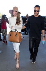 CHRISSY TEIGEN Arrives at Los Angeles International Airport