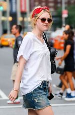 DAKOTA FANNING in Denim Shorts Out in New York