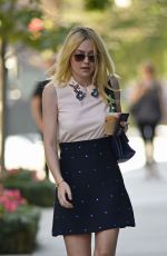 DAKOTA FANNING in Short Skirt Out in New York