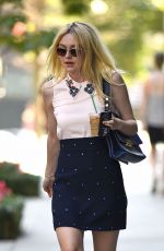 DAKOTA FANNING in Short Skirt Out in New York