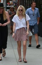 DAKOTA FANNING in Short Skirt Out in Soho