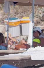ELLIE GOULDING at a Beach in Formentera