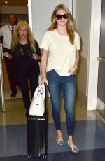 KATE UPTON Arrives at Los Angeles International Airport