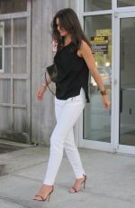 KATIE HOLMES at East Hampton Airport in New York