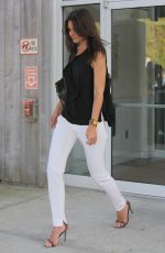 KATIE HOLMES at East Hampton Airport in New York