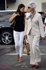 KATIE HOLMES Getting on a Helicopter Going to the Hamptons