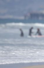 KESHA in Bikini Bottoms at a Beach in Santa Monica